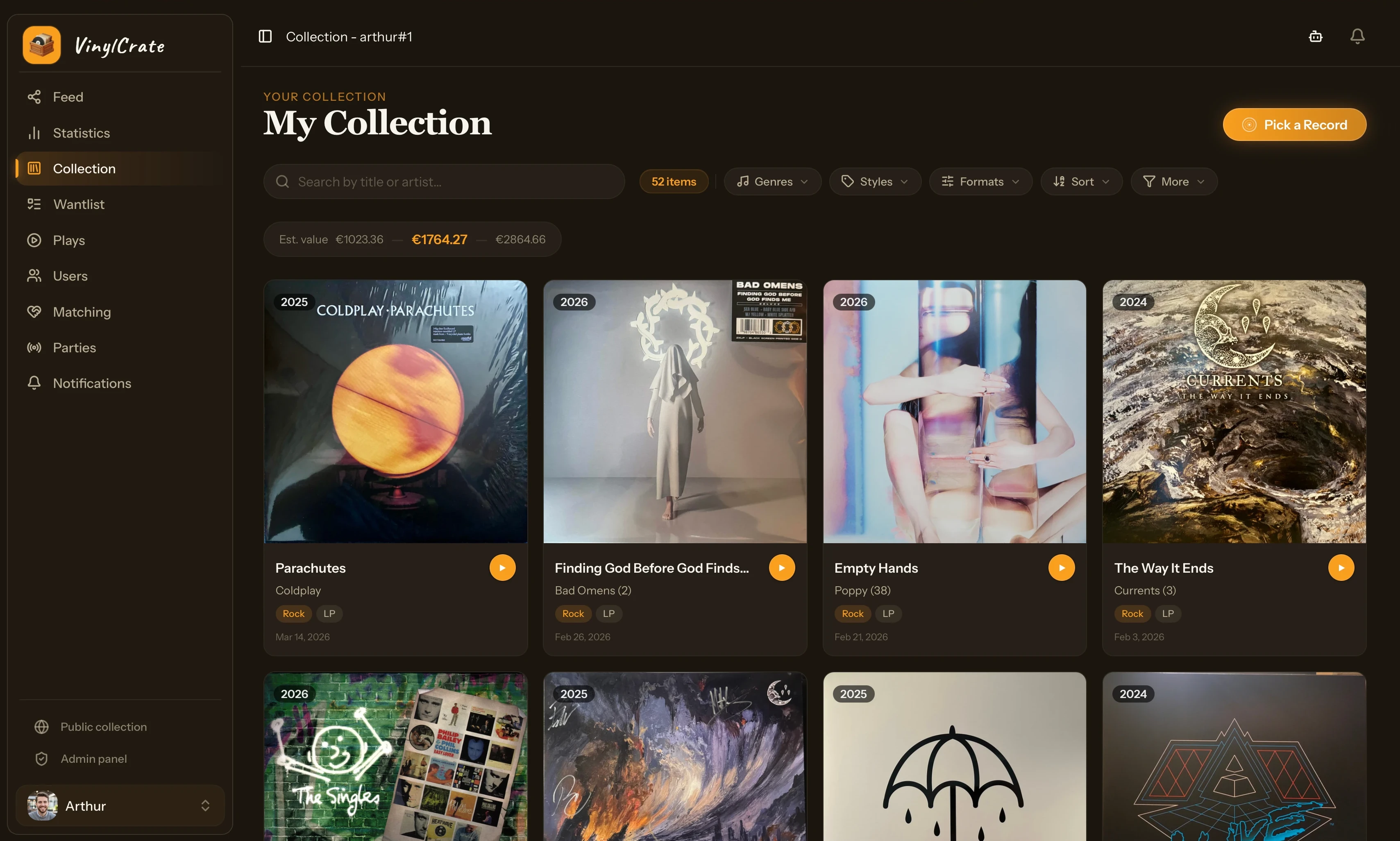 The VinylCrate collection view, album artwork stacked in a warm dark interface